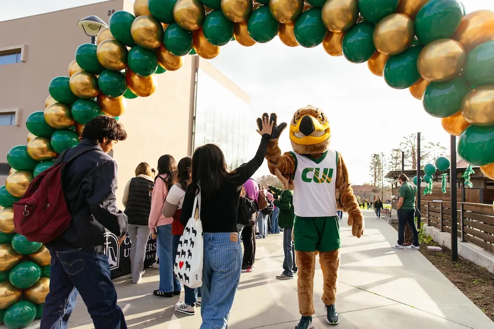 Marty the Eagle greets students at last year’s Hispanic Leadership Conference 